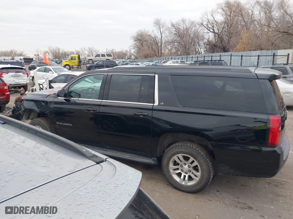 2019 Chevrolet Suburban LT with VIN 1GNSKHKC0KR159583, listed as a IAAI auction lot 41309350 with 196,844 mi miles. Bid and sale history available at carsss.com. Image 14.