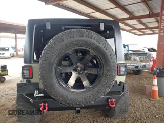 2017 Jeep Wrangler Unlimited Rubicon with VIN 1C4BJWFG7HL663203, listed as a IAAI auction lot 42391999 with 63,430 mi miles and . Bid and sale history available at DreamBid. Image 17.