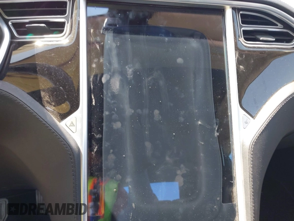 2014 Tesla Model S 60 with VIN 5YJSA1S11EFP33278, listed as a IAAI auction lot 42441781 with Not provided miles and . Bid and sale history available at DreamBid. Image 7.