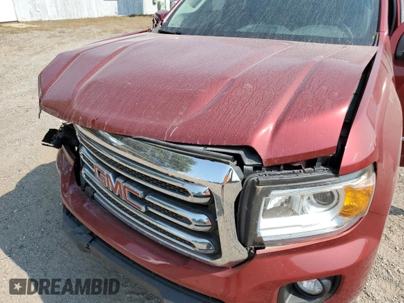 2016 GMC Canyon 4WD SLE with VIN 1GTH6CE35G1298295, listed as a Copart auction lot 71359754 with 68,624 mi miles and Clean Title. Bid and sale history available at carsss.com. Image 12.