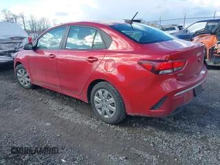 2023 Kia Rio S with VIN 3KPA24AD9PE512896, listed as a IAAI auction lot 41209063 with 32,505 mi miles. Bid and sale history available at carsss.com. Image 3.