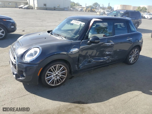 2015 MINI Cooper Hardtop 4 Door S with VIN WMWXU3C59F2B65795, listed as a Copart auction lot 75768864 with 120,979 mi miles and Salvage Title. Bid and sale history available at carsss.com. Image 1.