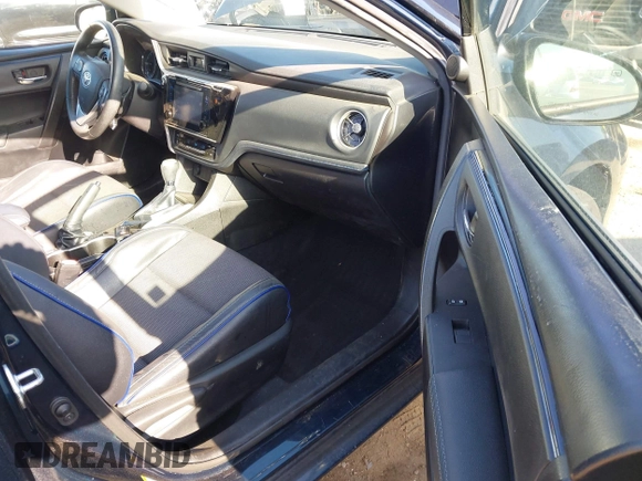 2019 Toyota Corolla L with VIN 5YFBURHE7KP922064, listed as a IAAI auction lot 41977741 with 54,896 mi miles and . Bid and sale history available at DreamBid. Image 5.