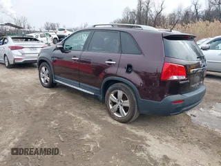 2012 Kia Sorento EX with VIN 5XYKU4A20CG200895, listed as a IAAI auction lot 41631262 with 176,997 mi miles. Bid and sale history available at carsss.com. Image 3.