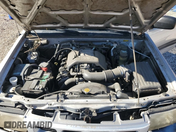 1999 Isuzu Rodeo S with VIN 4S2CK58W7X4357910, listed as a Copart auction lot 86955254 with 105,593 mi miles and Salvage Title. Bid and sale history available at DreamBid. Image 12.