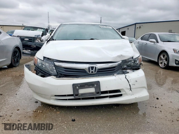 2012 Honda Civic LX z VIN 2HGFB2F50CH607469, wystawiony jako Copart lot #55878635 z przebiegiem 86 975 mil mil oraz Szkoda całkowita • Salvage title. Historia ofert i sprzedaży dostępna na DreamBid. Obrazek 5.