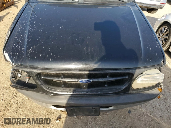 1998 Ford Explorer XL z VIN 1FMZU32E7WZC17972, wystawiony jako Copart lot #54849515 z przebiegiem 192 928 mil mil oraz Szkoda całkowita • Salvage title. Historia ofert i sprzedaży dostępna na DreamBid. Obrazek 11.