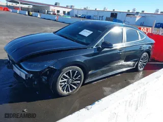 2020 Hyundai Sonata Limited with VIN 5NPEH4J28LH032174, listed as a IAAI auction lot 41283294 with 77,969 mi miles. Bid and sale history available at carsss.com. Image 2.