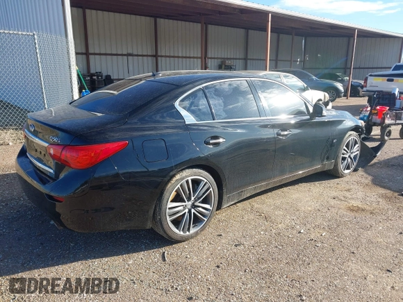 2015 Infiniti Q50 Premium z VIN JN1BV7AR5FM418350, wystawiony jako IAAI lot #41622894 z przebiegiem 135 478 mil mil oraz . Historia ofert i sprzedaży dostępna na DreamBid. Obrazek 4.
