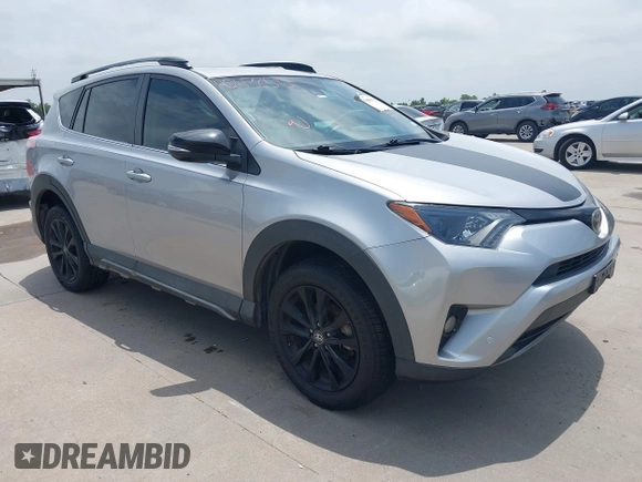2018 Toyota RAV4 XLE z VIN 2T3RFREV6JW818232, wystawiony jako IAAI lot #42438512 z przebiegiem 97 882 mil mil oraz . Historia ofert i sprzedaży dostępna na DreamBid. Obrazek 1.