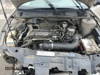 2004 Pontiac Sunfire z VIN 1G2JB12F147263198, wystawiony jako Copart lot #54842975 z przebiegiem 176 733 mil mil oraz Szkody całkowita. Historia ofert i sprzedaży dostępna na DreamBid. Obrazek 11.