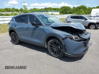 2024 Mazda CX-5 S Carbon Edition z VIN JM3KFBCL9R0514538, wystawiony jako Copart lot #58518615 z przebiegiem 23 037 mil mil oraz Tytuł czysty. Historia ofert i sprzedaży dostępna na DreamBid. Obrazek 4.