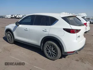 2017 Mazda CX-5 Sport with VIN JM3KFABL5H0124725, listed as a IAAI auction lot 40487298 with 103,889 mi miles. Bid and sale history available at carsss.com. Image 3.