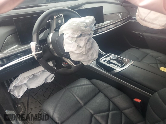 2024 BMW 7 Series 740i xDrive with VIN WBA33EH09RCR24113, listed as a Copart auction lot 56699365 with Not provided miles and Salvage title. Bid and sale history available at DreamBid. Image 8.