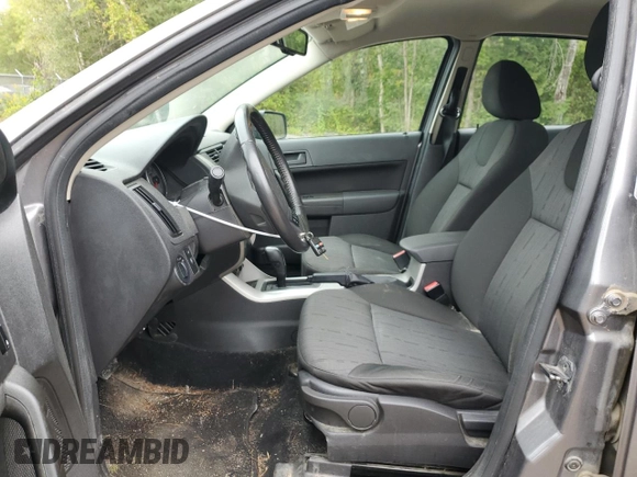 2009 Ford Focus SE with VIN 1FAHP35N39W123621, listed as a Copart auction lot 69211464 with 185,073 mi miles and Clean Title. Bid and sale history available at DreamBid. Image 7.
