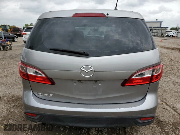 2015 Mazda 5 Sport z VIN JM1CW2BL2F0179147, wystawiony jako Copart lot #54125515 z przebiegiem 94 294 mil mil oraz Szkoda całkowita • Salvage title. Historia ofert i sprzedaży dostępna na DreamBid. Obrazek 6.