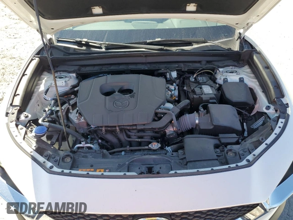 2024 Mazda CX-30 S with VIN 3MVDMBAM0RM665637, listed as a Copart auction lot 47190485 with 8,781 mi miles and Salvage Title. Bid and sale history available at DreamBid. Image 12.