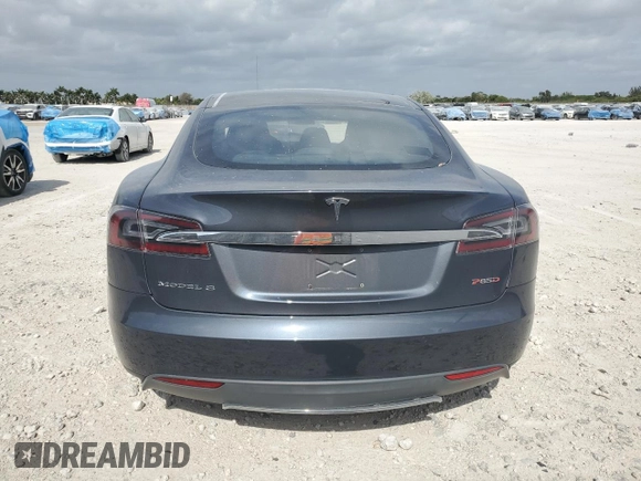 2014 Tesla Model S P85D with VIN 5YJSA1H28EFP62793, listed as a Copart auction lot 52902495 with Not Provided miles and Salvage Title. Bid and sale history available at DreamBid. Image 6.