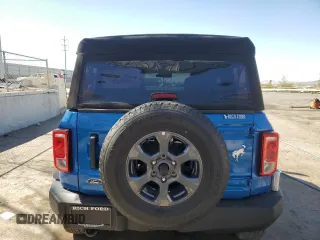 2024 Ford Bronco Big Bend z VIN 1FMDE7BH9RLB50114, wystawiony jako Copart lot #52157635 z przebiegiem 1 002 mil mil oraz Szkoda całkowita • Salvage title. Historia ofert i sprzedaży dostępna na DreamBid. Obrazek 6.