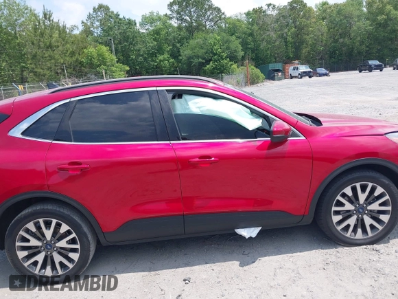 2020 Ford Escape Titanium z VIN 1FMCU9J92LUA39457, wystawiony jako IAAI lot #42222441 z przebiegiem 107 148 mil mil oraz . Historia ofert i sprzedaży dostępna na DreamBid. Obrazek 13.