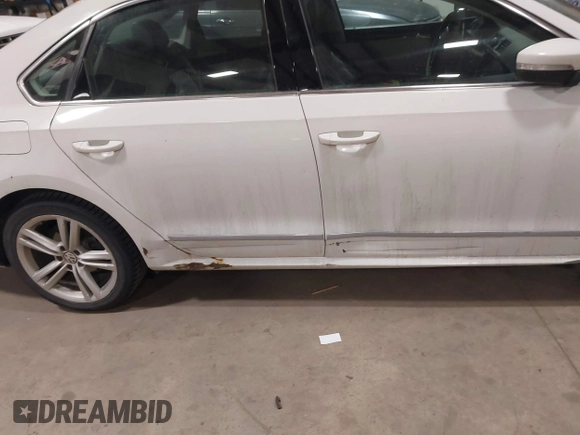 2014 Volkswagen Passat SEL Premium with VIN 1VWCS7A36EC057394, listed as a IAAI auction lot 41254293 with 134,715 mi miles. Bid and sale history available at carsss.com. Image 6.