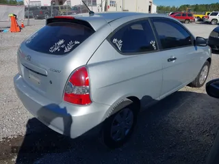 2007 Hyundai Accent GS with VIN KMHCM36C47U003261, listed as a IAAI auction lot 40883034 with 108,725 mi miles. Bid and sale history available at carsss.com. Image 4.