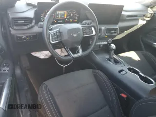 2024 Ford Mustang EcoBoost z VIN 1FA6P8TH3R5118832, wystawiony jako Copart lot #48633515 z przebiegiem 23 426 mil mil oraz Szkoda całkowita • Salvage title. Historia ofert i sprzedaży dostępna na DreamBid. Obrazek 8.