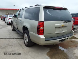 2013 Chevrolet Suburban LT with VIN 1GNSKJE74DR166223, listed as a IAAI auction lot 42172184 with 200,901 mi miles and . Bid and sale history available at DreamBid. Image 3.