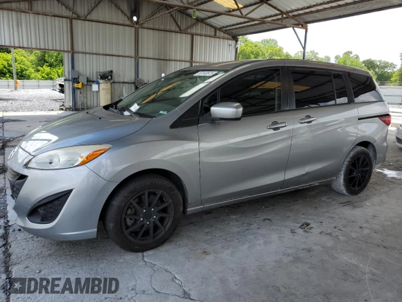 2012 Mazda 5 Sport с VIN JM1CW2BL0C0122019, выставлен на аукционе Copart как лот 56193675 с пробегом 98 712 миль миль и Списание • Salvage title. История ставок и продаж доступна на DreamBid. Изображение 1.