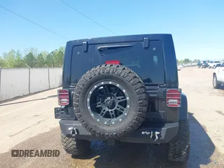 2017 Jeep Wrangler Unlimited Sahara with VIN 1C4BJWEG4HL637482, listed as a IAAI auction lot 41951349 with 76,030 mi miles. Bid and sale history available at carsss.com. Image 16.