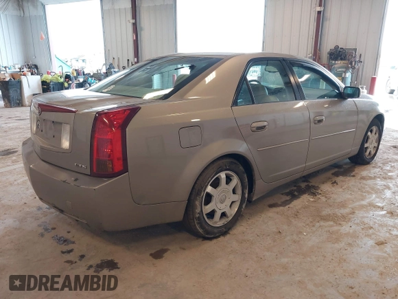 2004 Cadillac CTS with VIN 1G6DM577940153314, listed as a IAAI auction lot 41729457 with 127,038 mi miles. Bid and sale history available at carsss.com. Image 4.