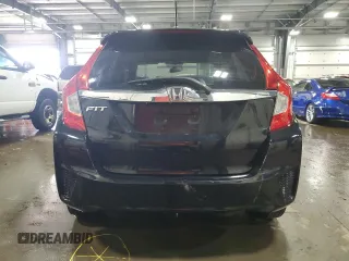 2015 Honda Fit EX-L z VIN 3HGGK5H88FM721318, wystawiony jako Copart lot #56717255 z przebiegiem 107 235 mil mil oraz Szkoda całkowita • Salvage title. Historia ofert i sprzedaży dostępna na DreamBid. Obrazek 6.