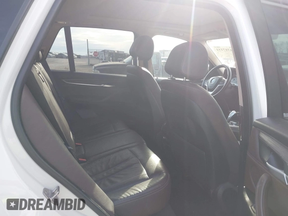 2016 BMW X5 xDrive35i with VIN 5UXKR0C5XG0P21683, listed as a IAAI auction lot 41717151 with 98,696 mi miles. Bid and sale history available at carsss.com. Image 8.