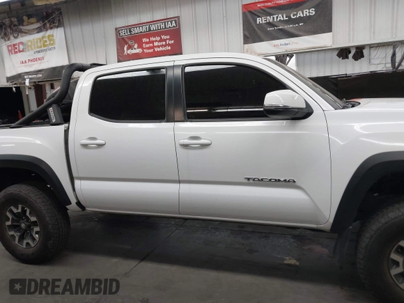 2022 Toyota Tacoma SR with VIN 3TMCZ5AN5NM480311, listed as a IAAI auction lot 42542600 with 43,297 mi miles and . Bid and sale history available at DreamBid. Image 14.