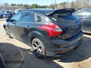 2014 Ford Focus ST with VIN 1FADP3L99EL191826, listed as a IAAI auction lot 41526553 with 131,131 mi miles and . Bid and sale history available at carsss.com. Image 3.