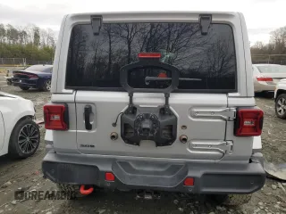 2023 Jeep Wrangler Rubicon Farout with VIN 1C4JJXFM4PW589923, listed as a Copart auction lot 48181205 with 9,814 mi miles and Salvage title. Bid and sale history available at DreamBid. Image 6.