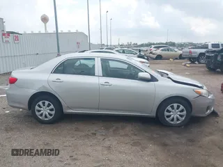 2013 Toyota Corolla L with VIN 5YFBU4EE8DP161765, listed as a IAAI auction lot 42109708 with 105,931 mi miles and . Bid and sale history available at DreamBid. Image 14.