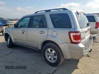 2008 Ford Escape Limited with VIN 1FMCU04108KA46976, listed as a Copart auction lot 60576595 with 177,256 mi miles and Salvage title. Bid and sale history available at DreamBid. Image 2.