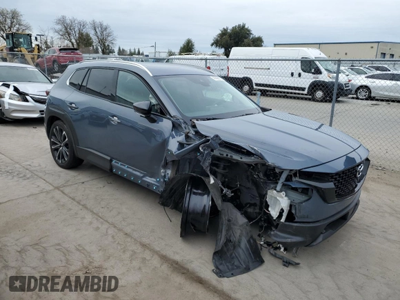 2023 Mazda CX-50 S Premium Plus with VIN 7MMVABEM7PN101642, listed as a Copart auction lot 47498675 with 12,299 mi miles and Salvage Title. Bid and sale history available at DreamBid. Image 4.