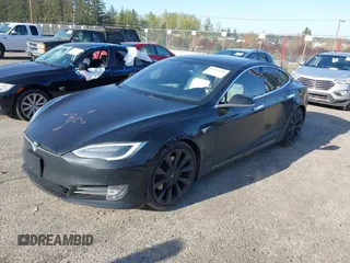 2018 Tesla Model S 75D with VIN 5YJSA1E28JF273809, listed as a IAAI auction lot 42029434 with 85,972 mi miles and . Bid and sale history available at DreamBid. Image 20.