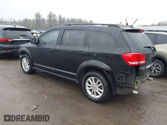 2015 Dodge Journey SXT with VIN 3C4PDDBG5FT639992, listed as a IAAI auction lot 41958496 with 132,410 mi miles and . Bid and sale history available at DreamBid. Image 3.