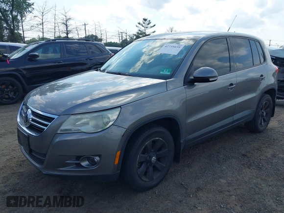 2010 Volkswagen Tiguan S with VIN WVGBV7AX8AW526711, listed as a IAAI auction lot 42735039 with 149,436 mi miles and . Bid and sale history available at DreamBid. Image 2.
