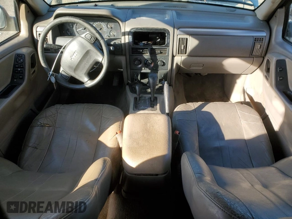 2004 Jeep Grand Cherokee with VIN 1J8GW48N24C304268, listed as a Copart auction lot 45559065 with 252,903 mi miles and Salvage title. Bid and sale history available at DreamBid. Image 8.