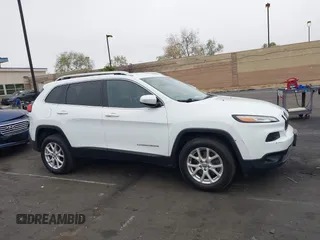 2015 Jeep Cherokee Latitude with VIN 1C4PJLCB0FW761871, listed as a IAAI auction lot 42099336 with 213,049 mi miles and . Bid and sale history available at DreamBid. Image 14.