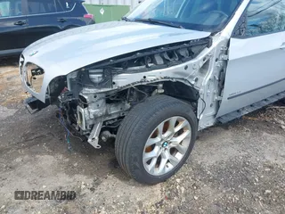 2012 BMW X5 35i z VIN 5UXZV4C56CL986384, wystawiony jako IAAI lot #41986665 z przebiegiem Nie podano mil oraz . Historia ofert i sprzedaży dostępna na DreamBid. Obrazek 17.