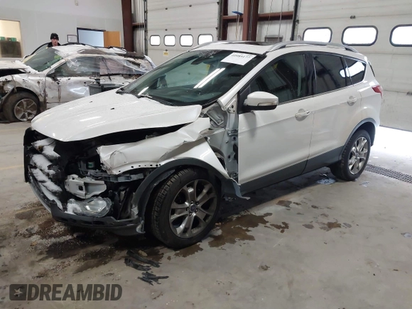 2014 Ford Escape Titanium with VIN 1FMCU9J91EUD43432, listed as a IAAI auction lot 40989177 with 110,383 mi miles and . Bid and sale history available at DreamBid. Image 2.