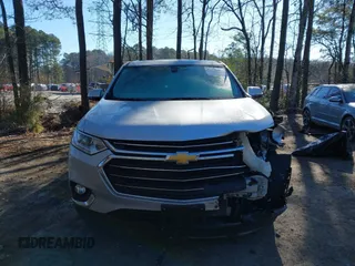 2020 Chevrolet Traverse LT Cloth with VIN 1GNERGKW4LJ215277, listed as a IAAI auction lot 41706394 with 84,762 mi miles. Bid and sale history available at carsss.com. Image 6.