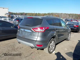 2014 Ford Escape Titanium with VIN 1FMCU9J94EUC50534, listed as a IAAI auction lot 41040341 with 115,502 mi miles. Bid and sale history available at carsss.com. Image 4.