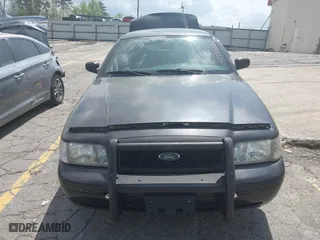 2004 Ford Police Interceptor Base w/3.27 Axle with VIN 2FAFP71W34X136279, listed as a IAAI auction lot 41945086 with 151,350 mi miles. Bid and sale history available at carsss.com. Image 12.
