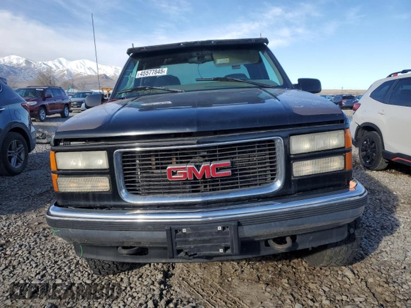 1997 GMC Sierra 1500 z VIN 2GTEK19R3V1548058, wystawiony jako Copart lot #45577845 z przebiegiem 229 738 mil mil oraz Szkoda całkowita • Salvage title. Historia ofert i sprzedaży dostępna na DreamBid. Obrazek 5.
